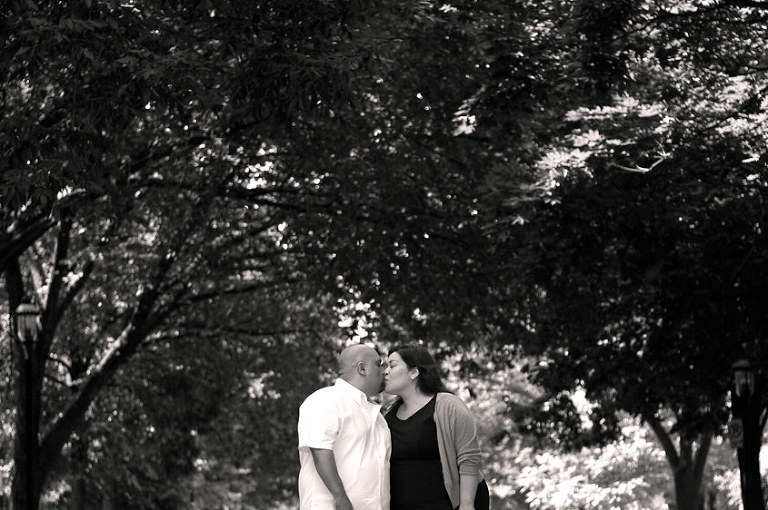 Black and white engagement photography under trees