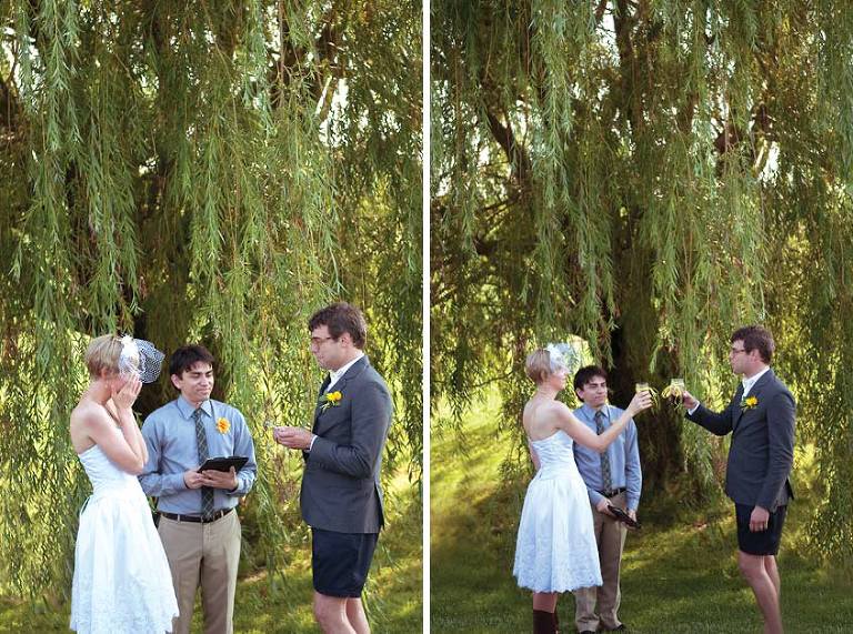 outdoor wedding under willow tree.  Bride and groom drinking wine from the same cup